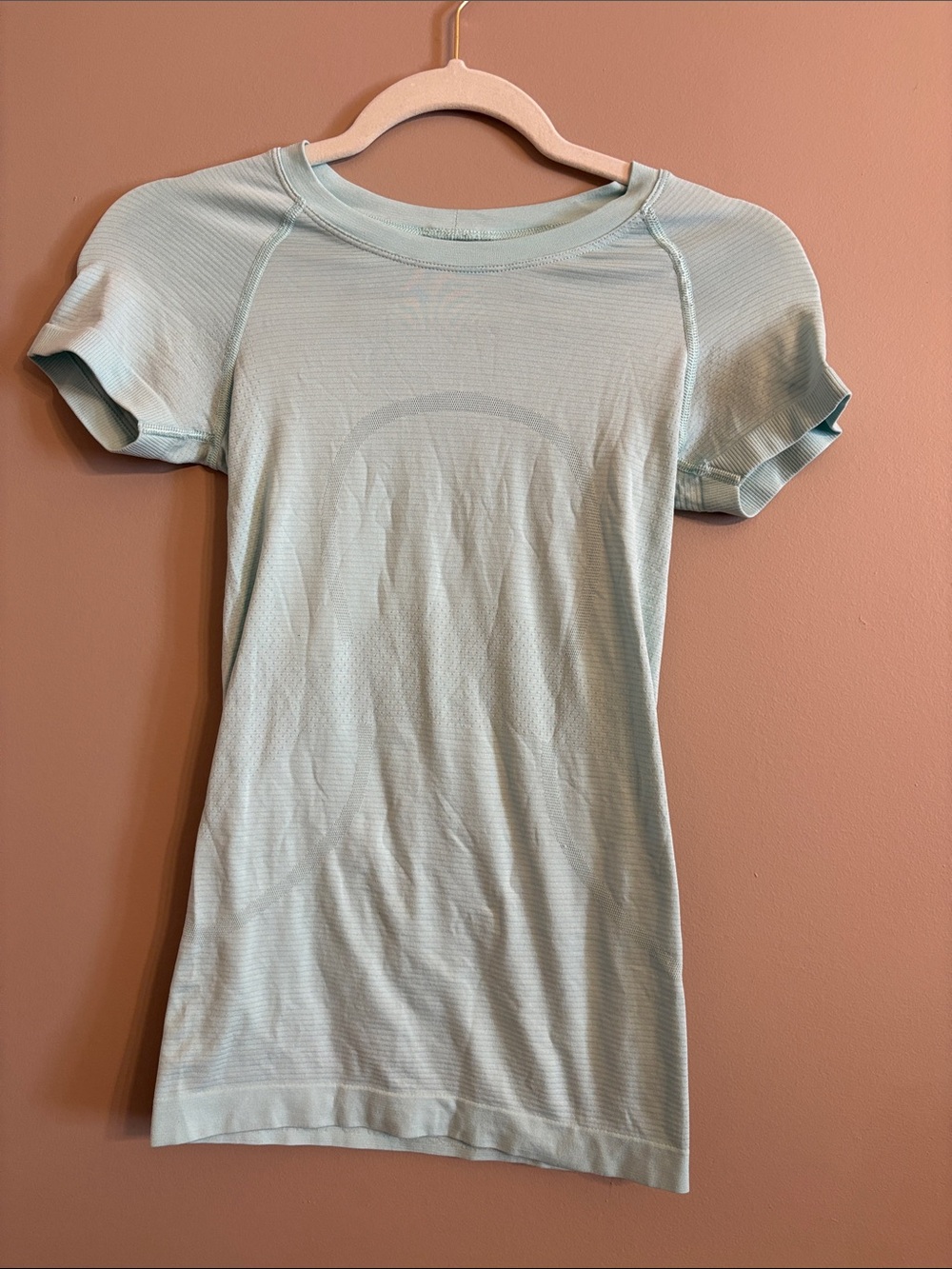 lululemon athletica light mint green short sleeve top. Never worn